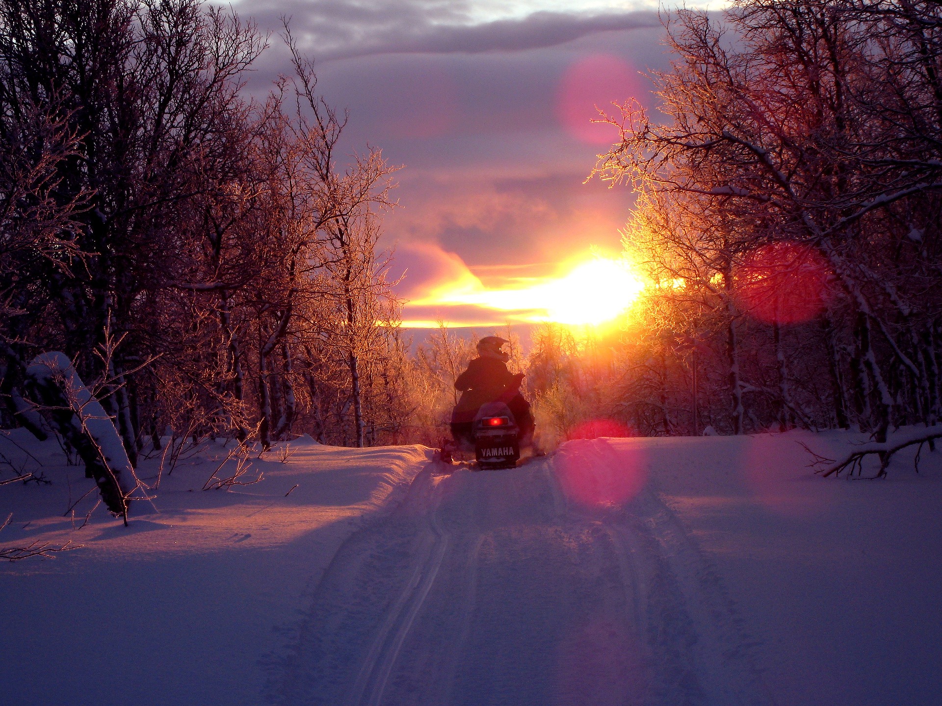 Snowmobile at Sunset